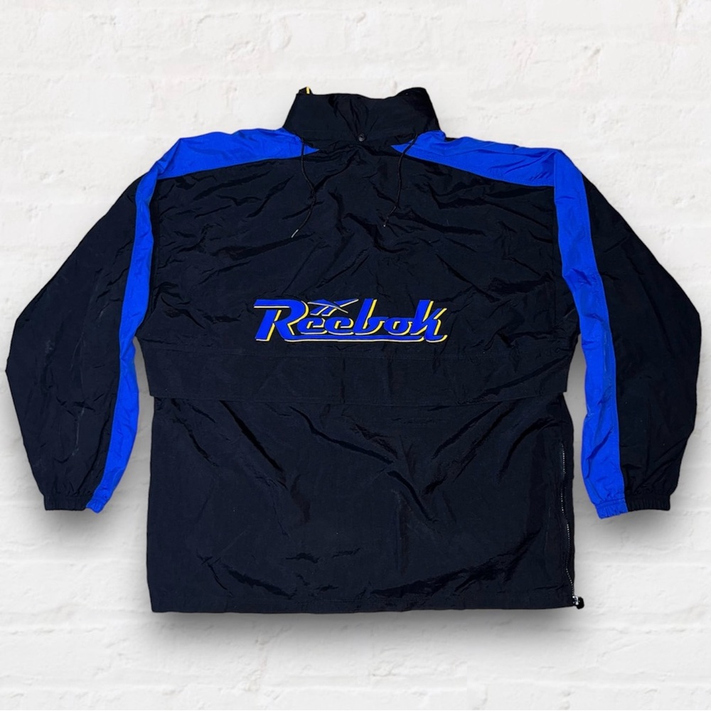 Vintage 90’s Reebok Spellout Windbreaker